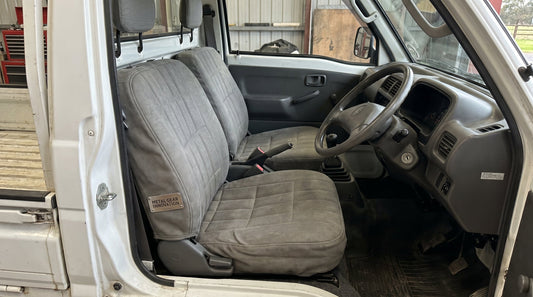Custom fit kei truck bench seat covers installed on Suzuki Carry compact Japanese mini truck bench seat